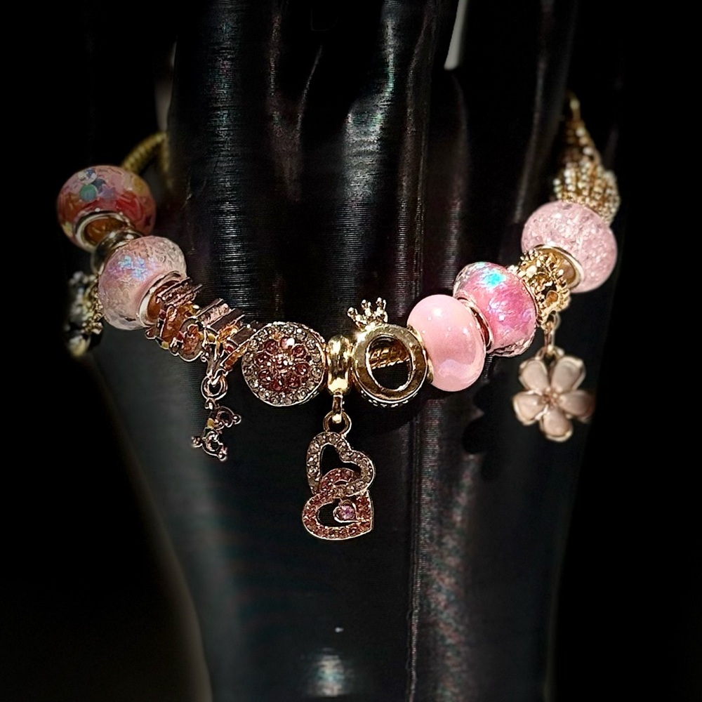 Elegant Pink and Gold Charm Bracelet